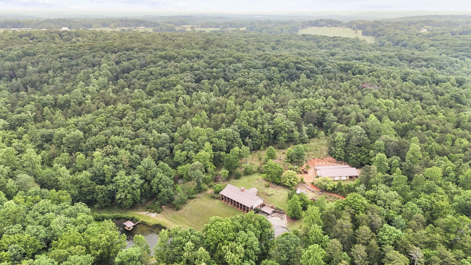 Aerial view of 4454 Ledan Ext, Gainesville GA, the estate and its acreage