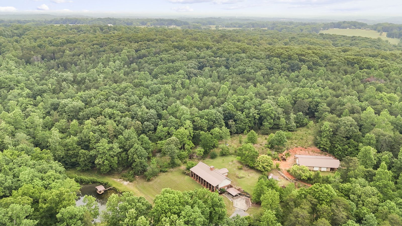 Aerial view of 4454 Ledan Ext, Gainesville GA, the estate and its acreage