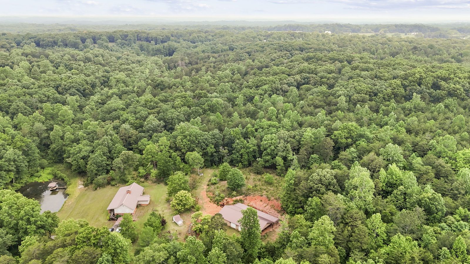 Aerial view of 4454 Ledan Ext, Gainesville GA, the estate and its acreage