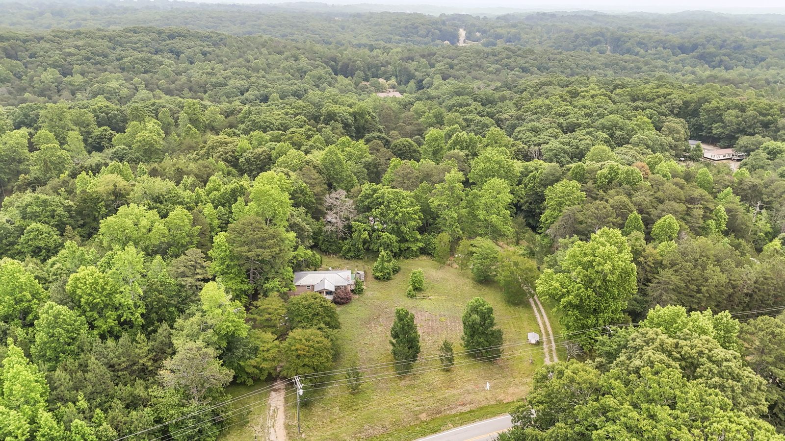 Aerial view of 4454 Ledan Ext, Gainesville GA, the estate and its acreage