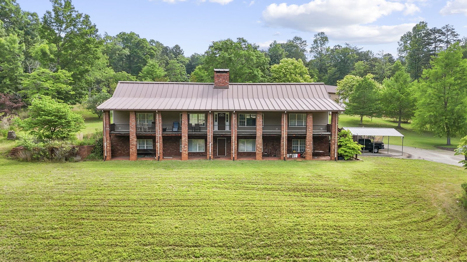 Aerial view of 4454 Ledan Ext, Gainesville GA, the estate and its acreage