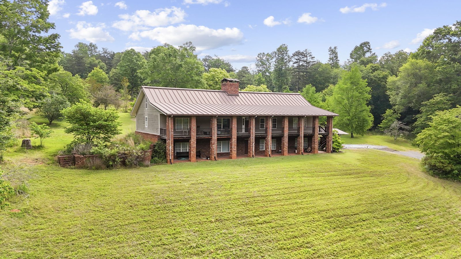 Aerial view of 4454 Ledan Ext, Gainesville GA, the estate and its acreage